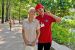 Carewell caregiver sharing a cheerful moment with a resident outdoors